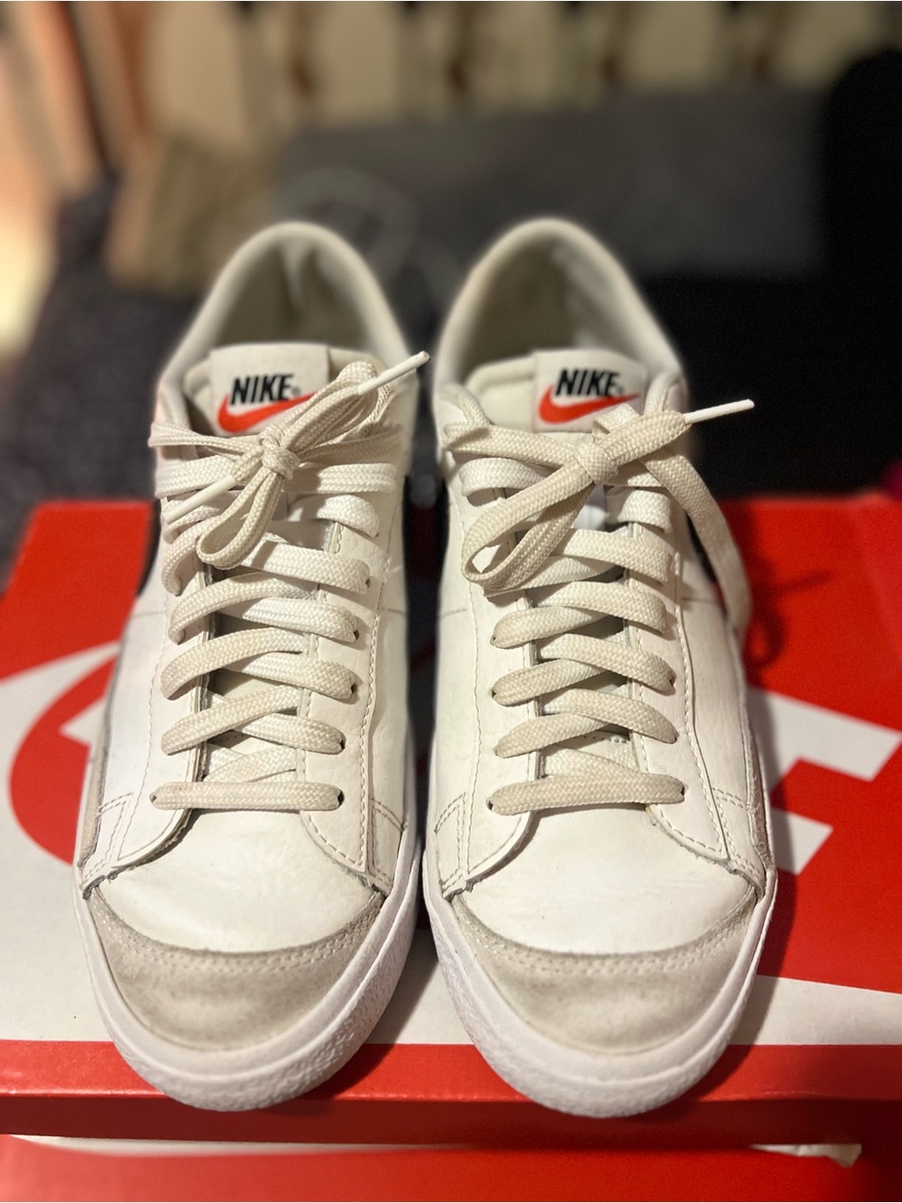 Nike White Sneakers with Orange Logo Accent
